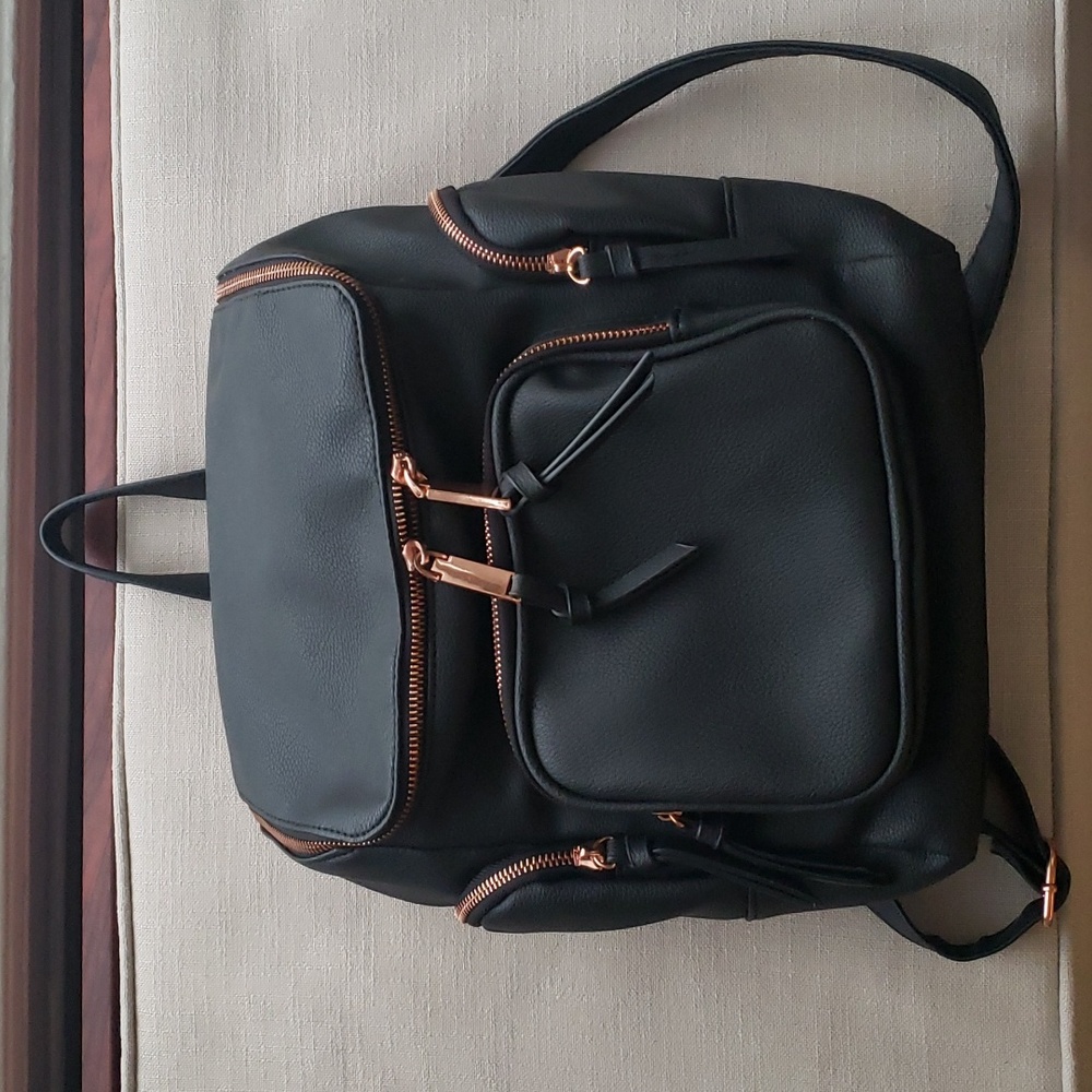 Francesca's black backpack w/rose gold accents